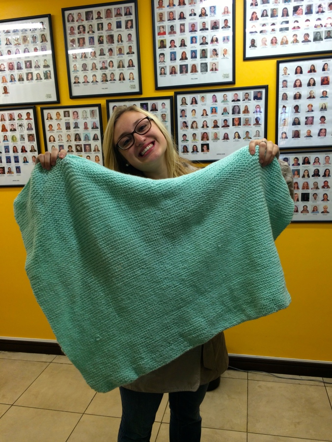 I thought I should throw in at least one picture for this post.. So here's the blanket I knitted before we went to donate them imperfections and all!